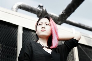 Asian young adult woman looking anxious